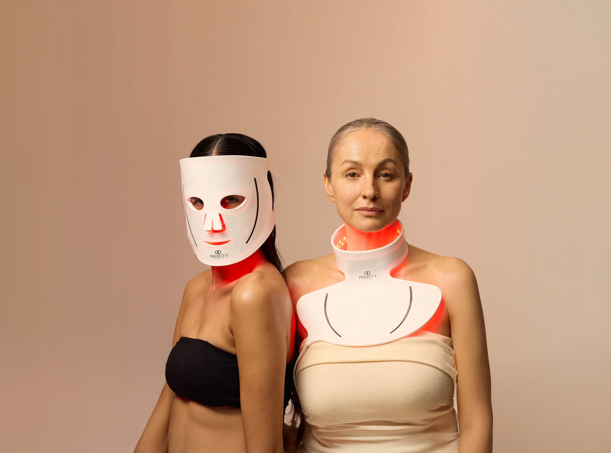 Two women of different ages sharing skincare with Lumalux face and neck mask.